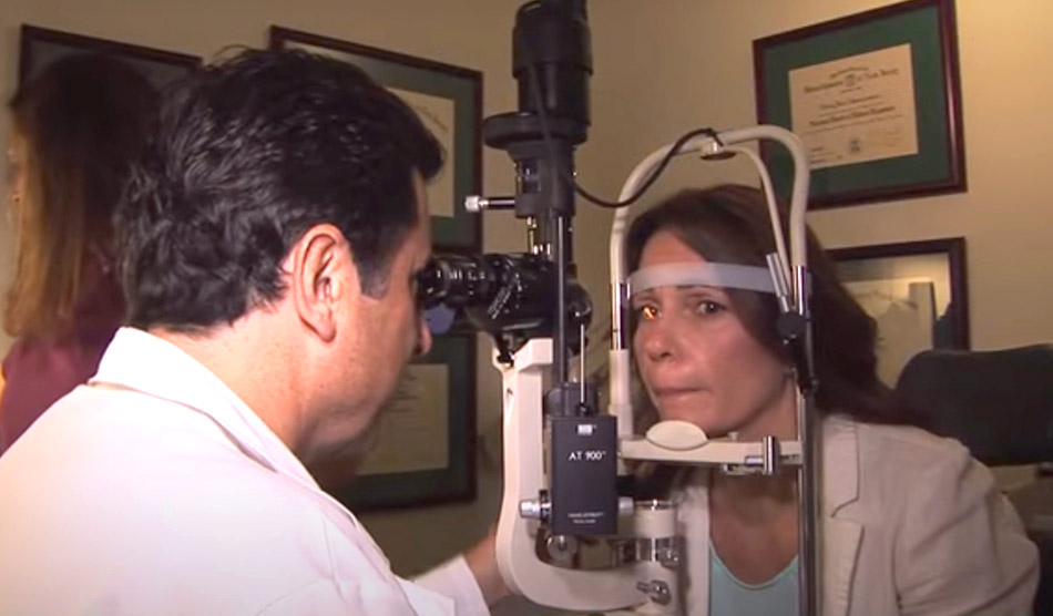 Dr. Wasserman examining a patient's eyes
