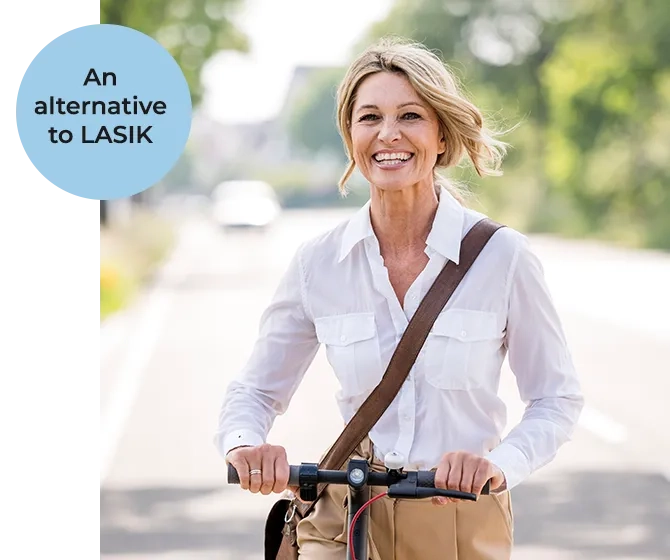 Image of woman riding scooter